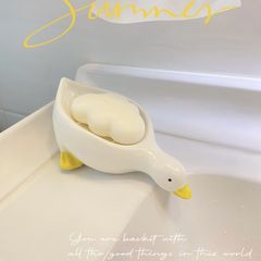 かわいい小さな黄色いアヒルの石鹸箱は水を溜めず、水を流します。デザインされた浴室のシンク収納石鹸箱排水ボード