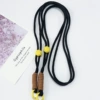 Adjustable long rope-black rope brown knot