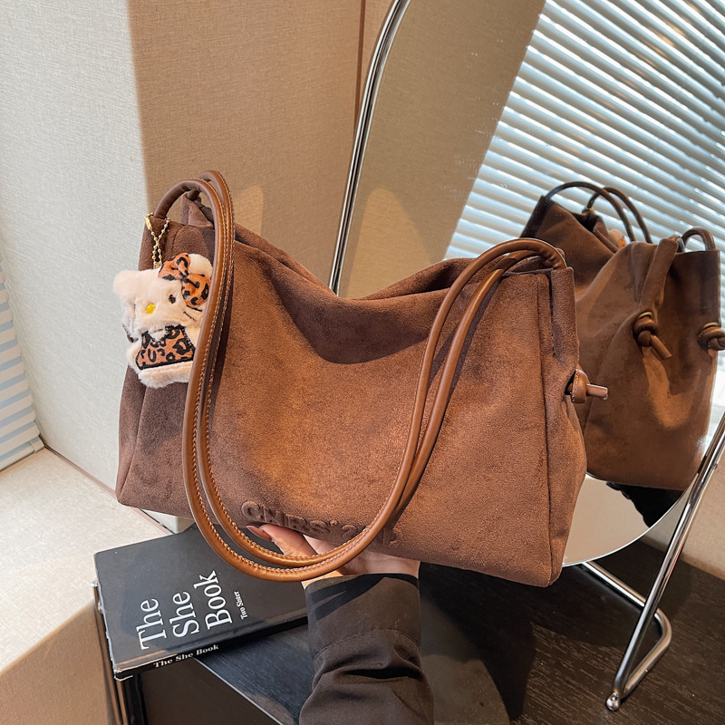 Otoño y invierno bolsas de gran capacidad para mujeres 2025 nuevo retro viaje bolsas de hombro de tern de camisa ocio bolsas de mano