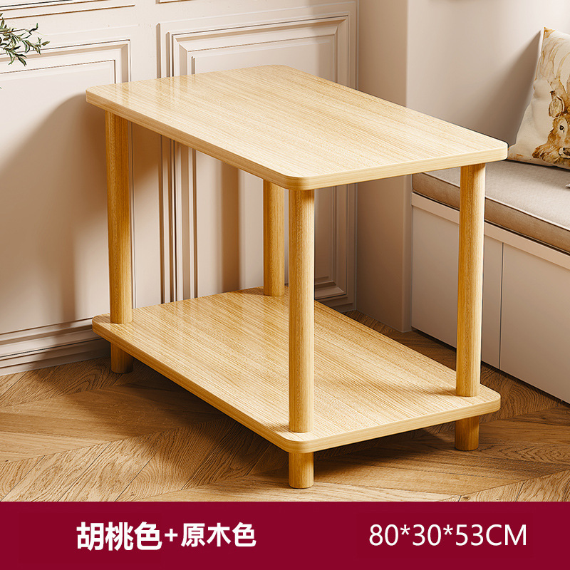 小さいテーブルのソファーの辺のいくつかのお茶のいくつかの家庭は移動することができます。|undefined