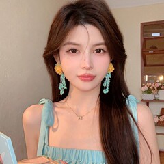 レトロなピンクの花の長いタイプの欧根紗のイヤリングの春夏の新型の高級感は耳飾りを誇張します。