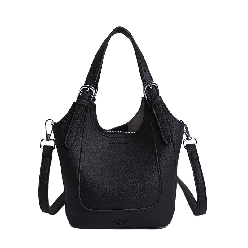 2026 nueva moda versátil cesta de verduras portátil bolso de cubo de agua de alta calidad litchi patrón ligero bolso de lujo bolso de mochila