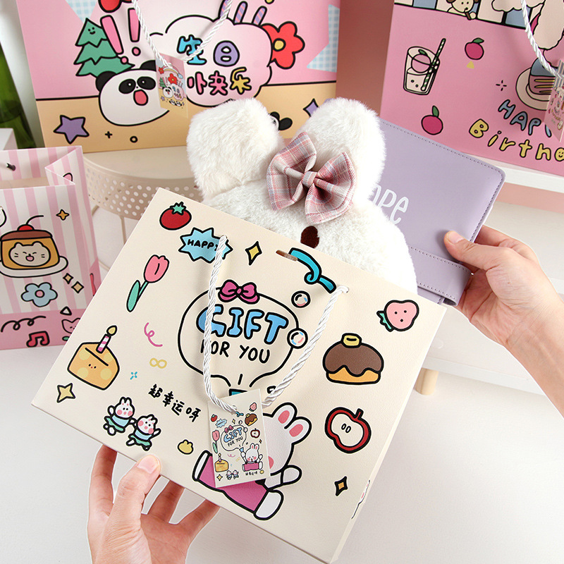 Bolsas de regalo de dibujos animados en bolsas de regalo de mano de tarjeta blanca bolsas de regalo de mano de estudiantes bolsas de regalo de mano