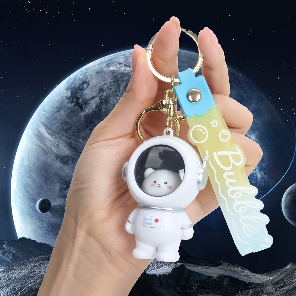 星空熊宇宙人宇宙飛行士星空灯キーホルダー学生がカップルにプレゼントしたかばんストラップ
