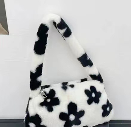 Bolsa de hombro axila 2023 nueva moda bolso de hombro portátil estilo occidental chica caliente estampado de leopardo ins bolso de las mujeres bolsa de felpa