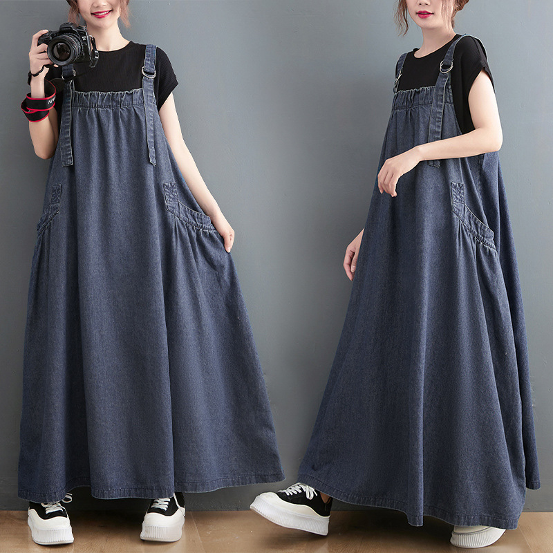 Korean and Japanese plus-size women's clothing, spring-summer mid-length suspender dress, loose and slimming denim suspender dress with a large hem Korean and Japanese plus-size women's clothing, spring-summer mid-length suspender dress, loose and slimming denim suspender dress with a large hem