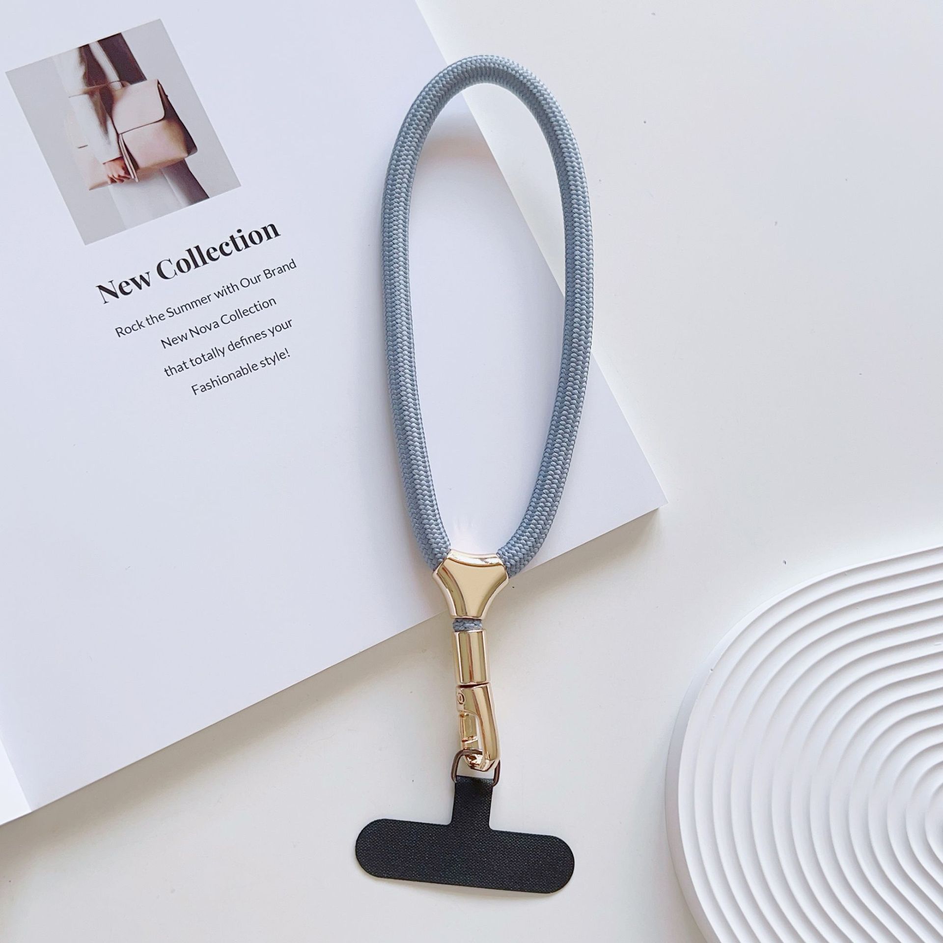 Cuerdas de muñeca ajustables de alta calidad con clips de hebilla pequeñas y frescas de poliéster corto para colgar teléfonos móviles simples y versátiles