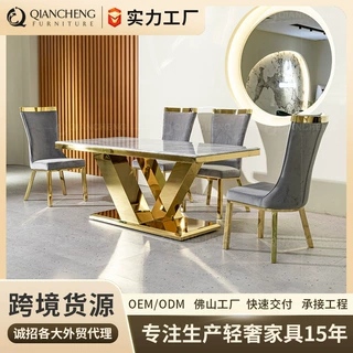 轻奢大理石餐桌 设计师样板房长方形8人餐桌椅组合现代创意不锈钢