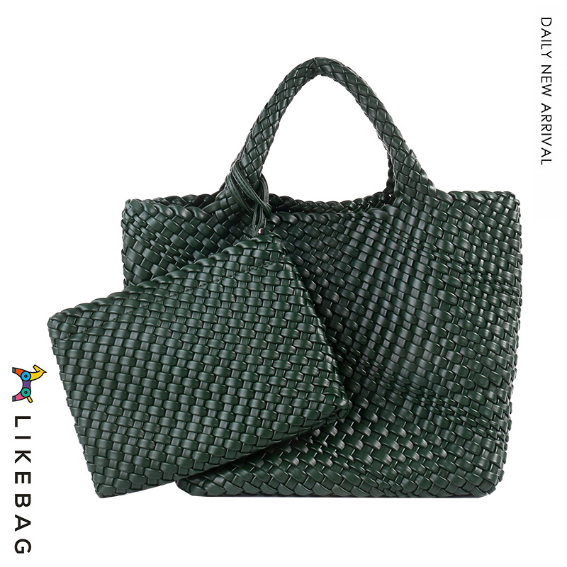 Bolso de mano de viajero de negocios transfronterizo bolso de mano de gran capacidad tejido PU 2022 nueva moda casual tejida Madre y niño bolsa