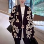 音符气质中长款针织毛衣