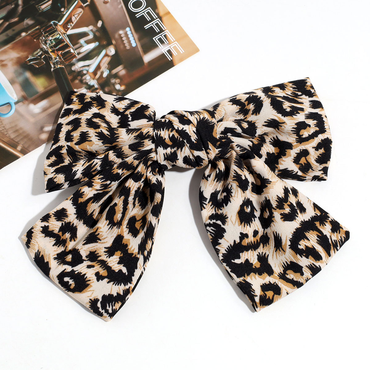 Estilo de moda europeo y americano personalidad nicho de diseño arco leopardo aro de pelo clip de resorte retrógrado anillo para el pelo accesorios para el pelo