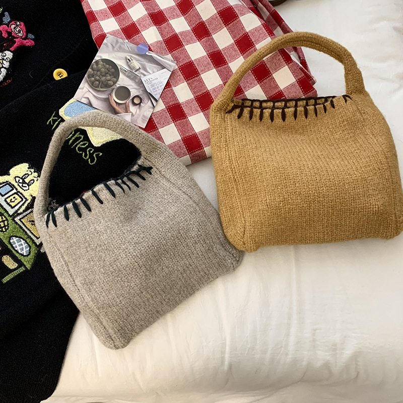 Nuevo bolso de tejido de otoño y invierno atmósfera sensación de bolsa de cesta de verduras bolso de tejido a mano bolso de lana de moda bolso de hombro