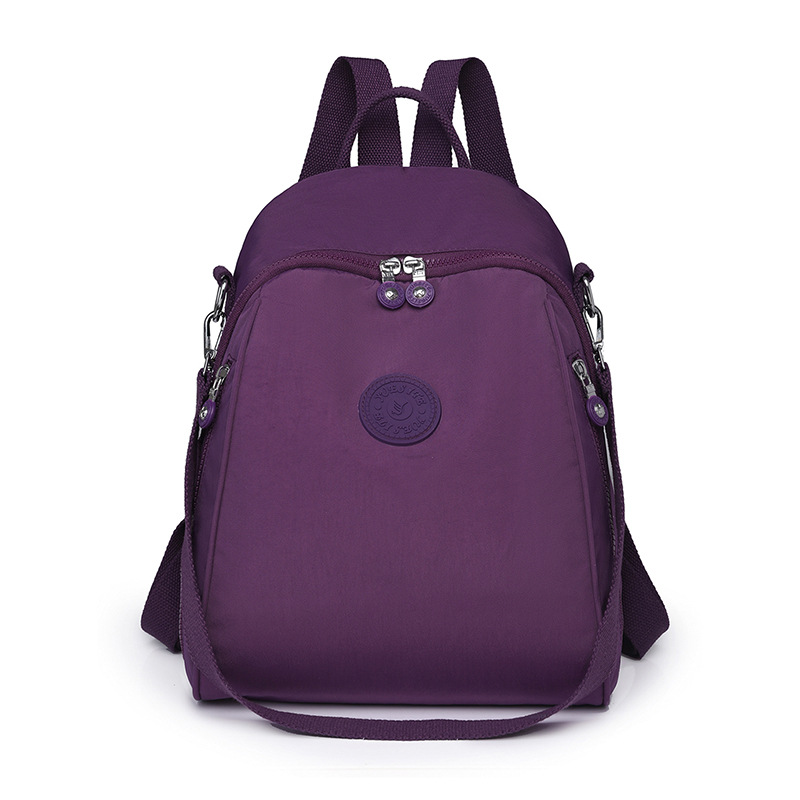 Mochila para mujer, mochila pequeña de tela Oxford de gran capacidad, resistente al agua, nueva mochila escolar de nailon lavanda de todo fósforo de moda