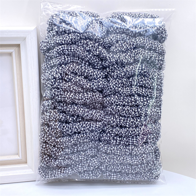 Montado en la tarjeta leche té color amor oso intestino grueso banda de pelo de las mujeres corbata de pelo cabeza cuerda banda de goma dos yuanes tienda de joyería