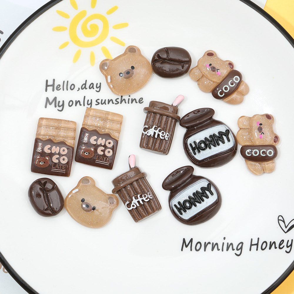 Cristal de dibujos animados Pan Oso cabeza resina accesorios DIY rojo neto joyería crema pegamento hecho a mano accesorios para el cabello caja del teléfono