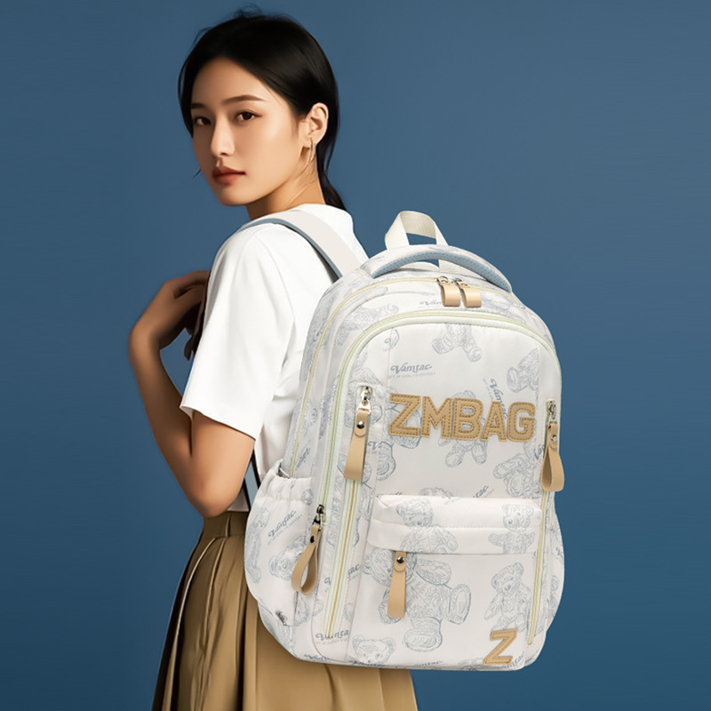 Sesame Baby Fashion Graffiti Mochila Hombres y mujeres Viajes de ocio Mochila de gran capacidad Todo fósforo Escuela secundaria