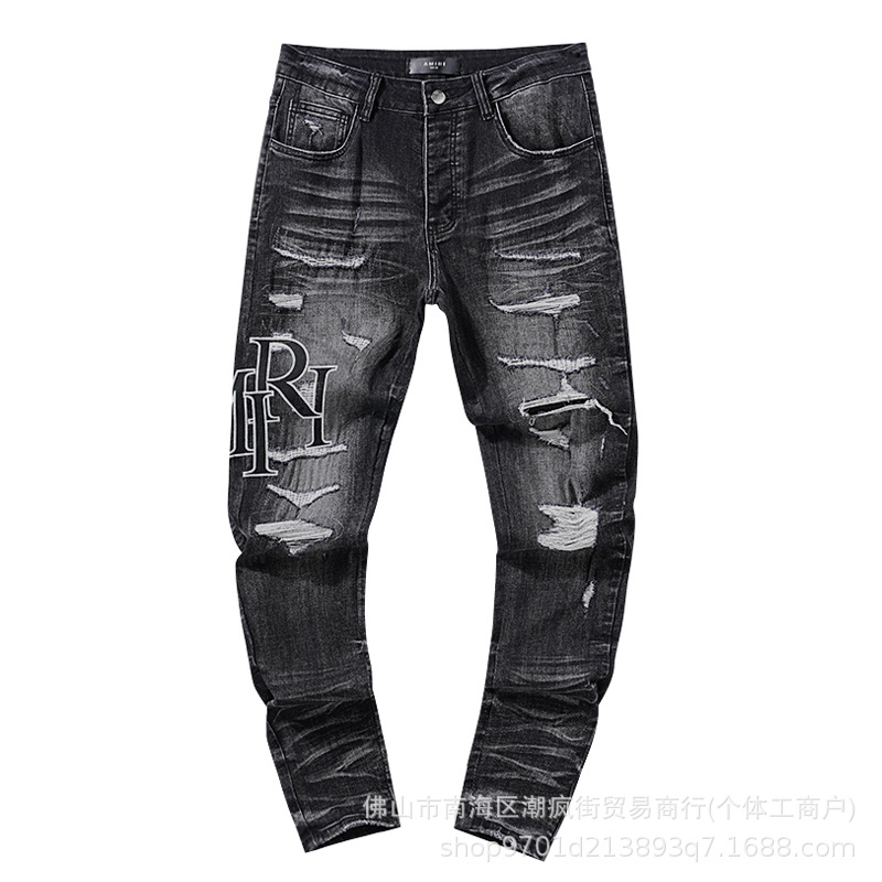 Purple impresión de salpicaduras de tinta transfronteriza belleza marea calle alta retro agujero casual pantalones de mezclilla para hombres y mujeres