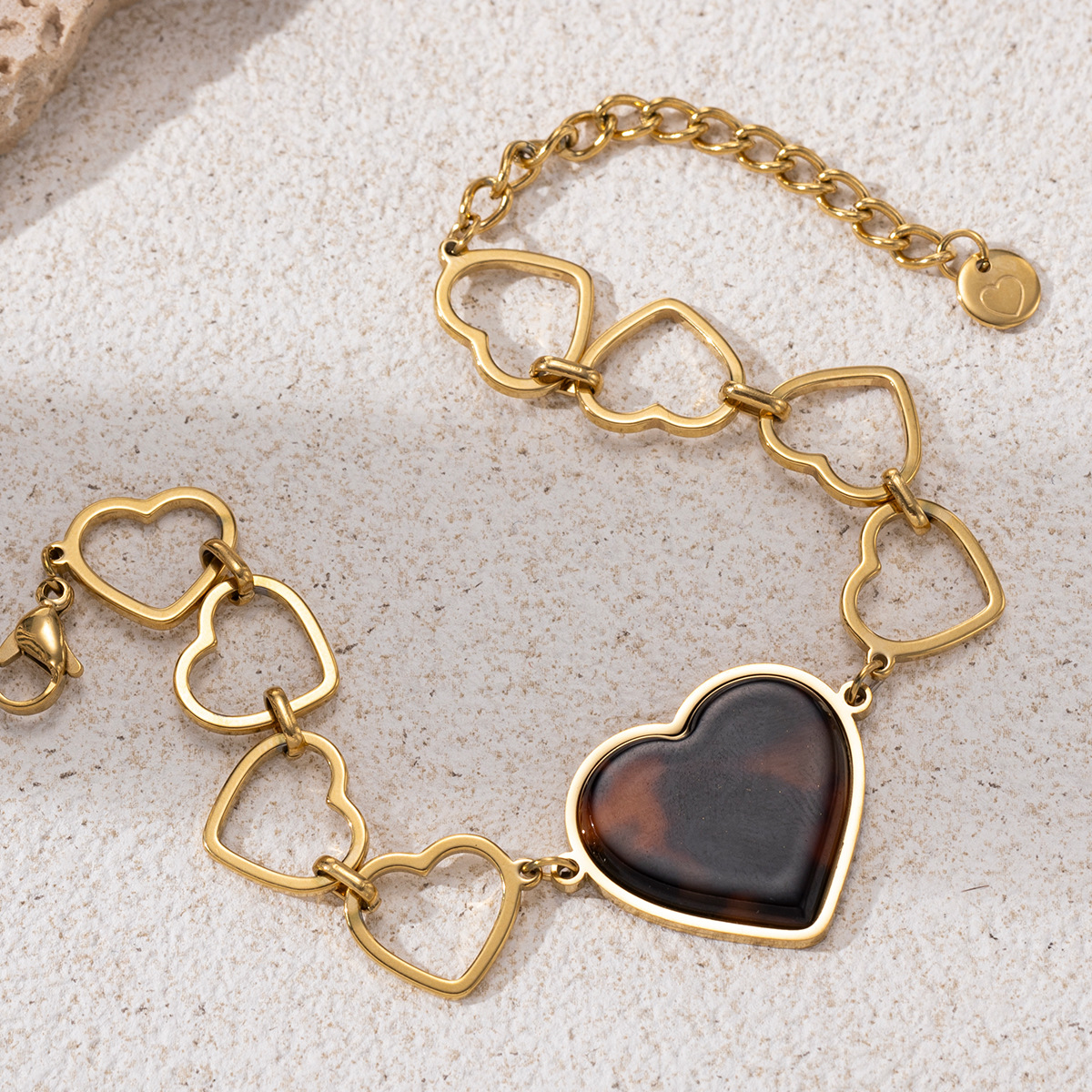 TENA Europa y América de acero inoxidable amor pulsera lujo ligero de alto nivel cadena de amor hueco de acero de titanio bicolor joyería de brazalete