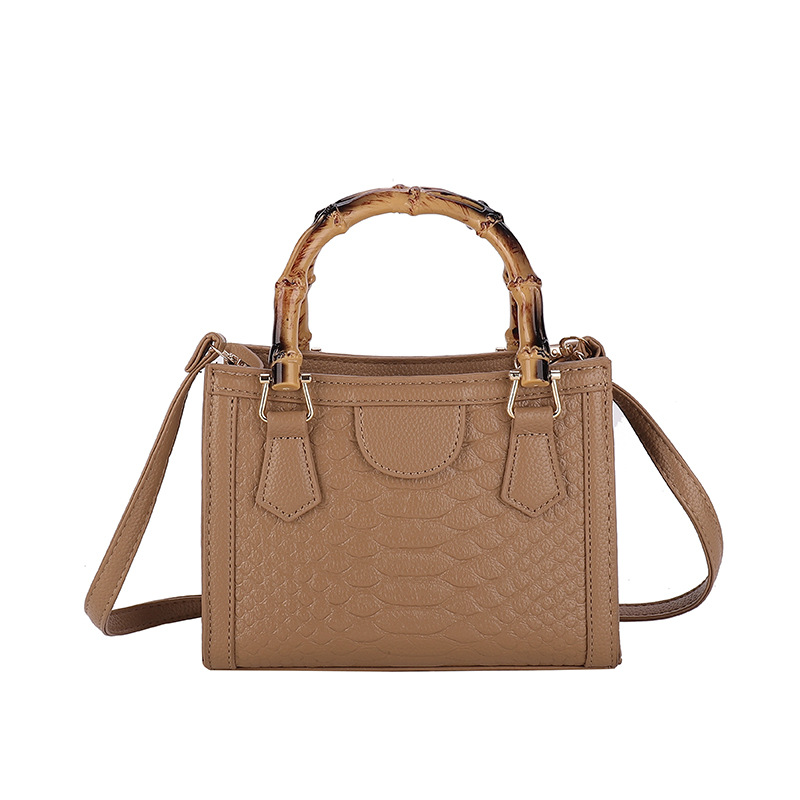 Europa y los Estados Unidos retro bolsos transfronterizos mujeres 2024 nueva moda simple bolsos de mano casuales cocodrilo mochila pequeña