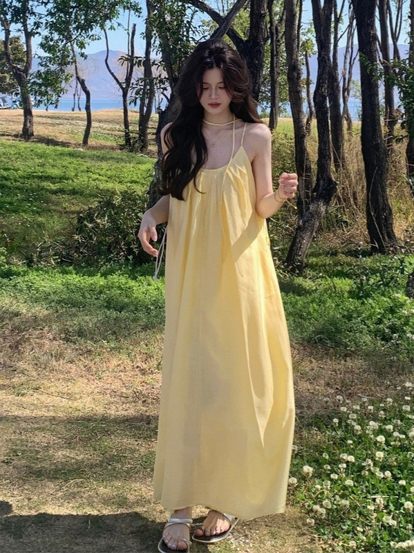 度假风温柔黄色吊带连衣裙女2025夏季新款海边气质宽松显瘦长裙子|undefined