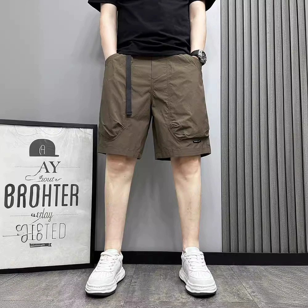 Летние мужские карго-шорты 2025 года с большими карманами, свободного кроя, дышащие пляжные шорты для молодых мужчин, оптовая доставка.