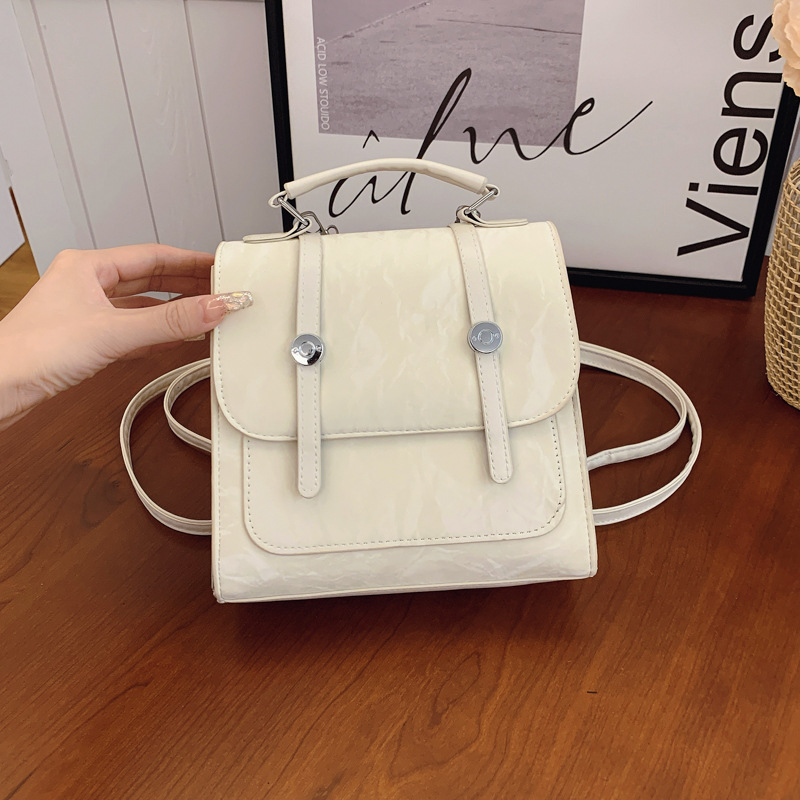 Mochila pequeña 2024 nuevo estilo de diseño de moda nicho de viaje bolsas escolares ligeras para mujeres ins para salir mochila pequeña