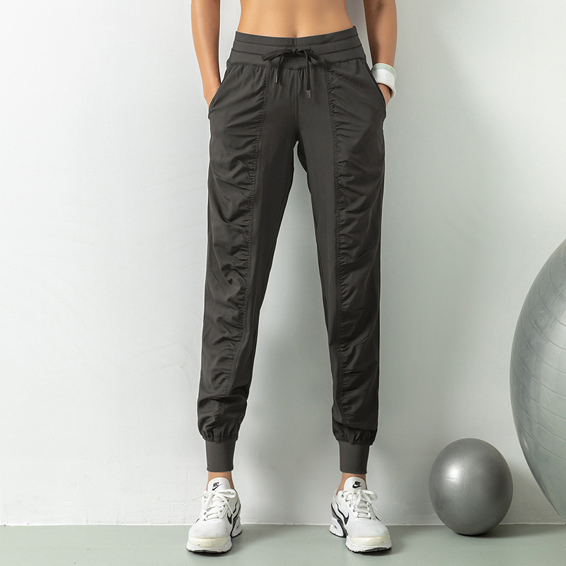 Pantalones de chándal sueltos transpirables, pantalones de fitness de yoga de entrenamiento para correr delgado para mujer, pantalones casuales de bolsillo de nueve puntos