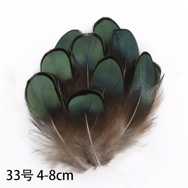 Fábrica al por mayor de bricolaje plumas pequeñas plumas naturales plumas de pollo salvaje plumas de pato jardín de infantes joyas hechas a mano gato divertido material de captura de sueños