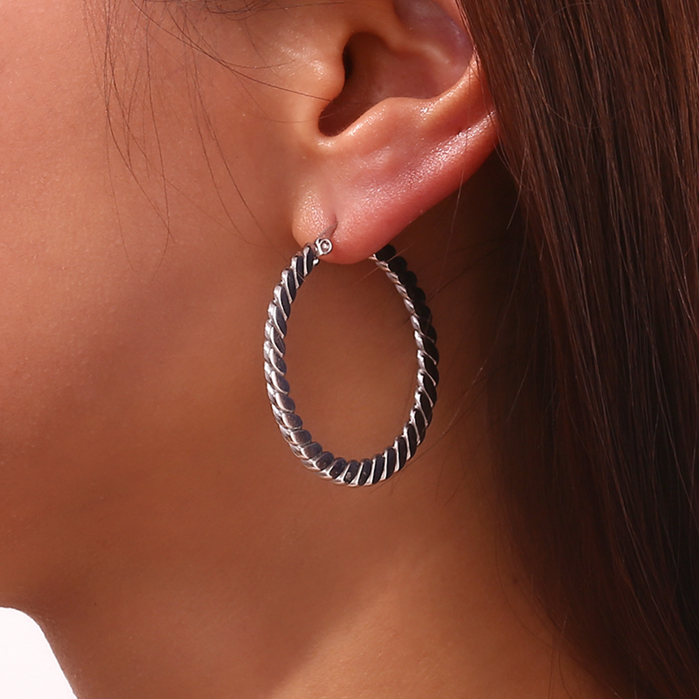 Model Show Flat Braided Circle Stainless Steel Earrings
