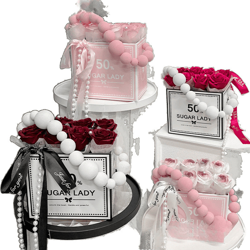 Estilo de nicho, sensación de atmósfera, rosa, caja de regalo portátil, flor artificial, producto terminado, graduación de cumpleaños, niña