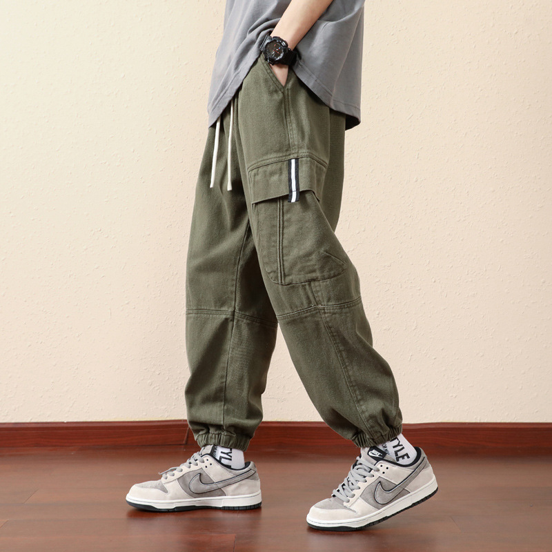 Pantalones de herramientas para niños primavera y otoño 2024 nueva tendencia suelta pantalones casuales pantalones de todo fósforo guapos para hombres