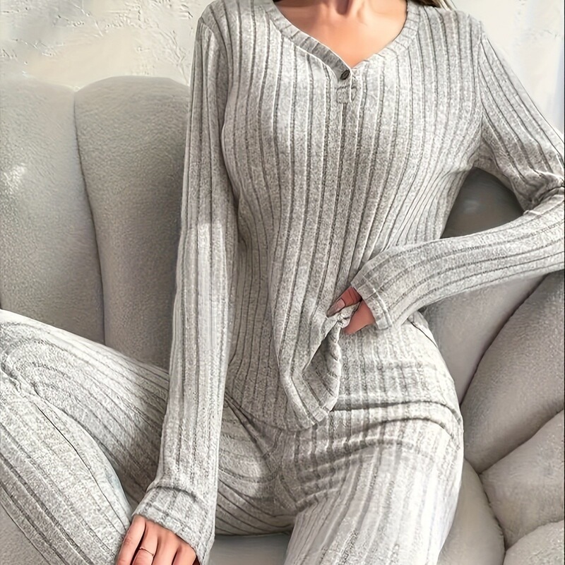 Autumn and winter collection: striped, long-sleeved, V-neck top paired with casual long pants, a comfortable and relaxed two-piece loungewear set Autumn and winter collection: striped, long-sleeved, V-neck top paired with casual long pants, a comfortable and relaxed two-piece loungewear set
