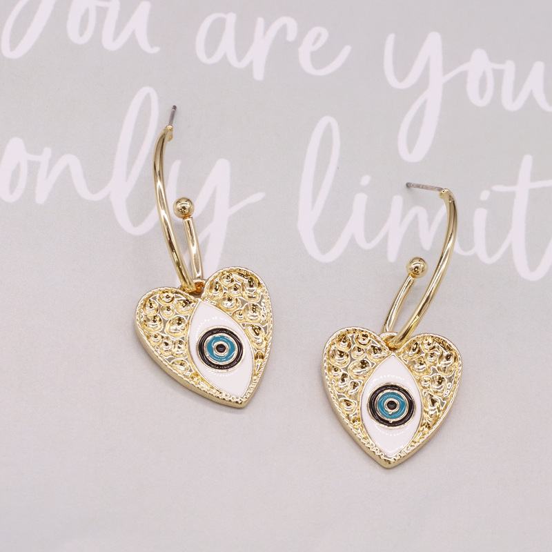 Retro Personality Alloy Turkish Devil Eye Heart Earrings Ethnic Style Earrings display picture 2