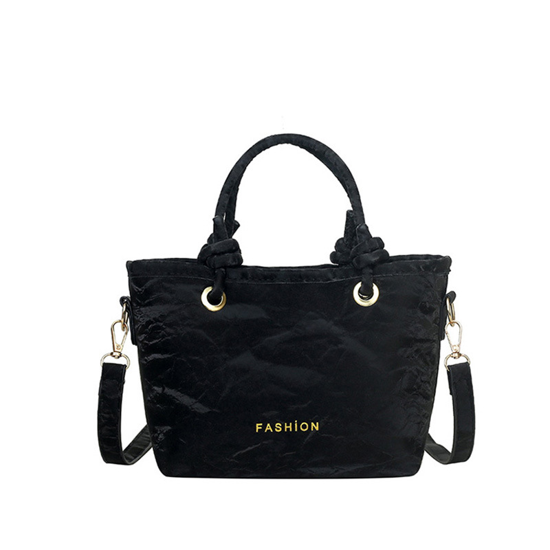 Tendencia versátil bolso de hombro 2025 nuevo estilo de moda casual bolso de cubo de mano para mujeres coreanas bolso de mochila simple para mujeres