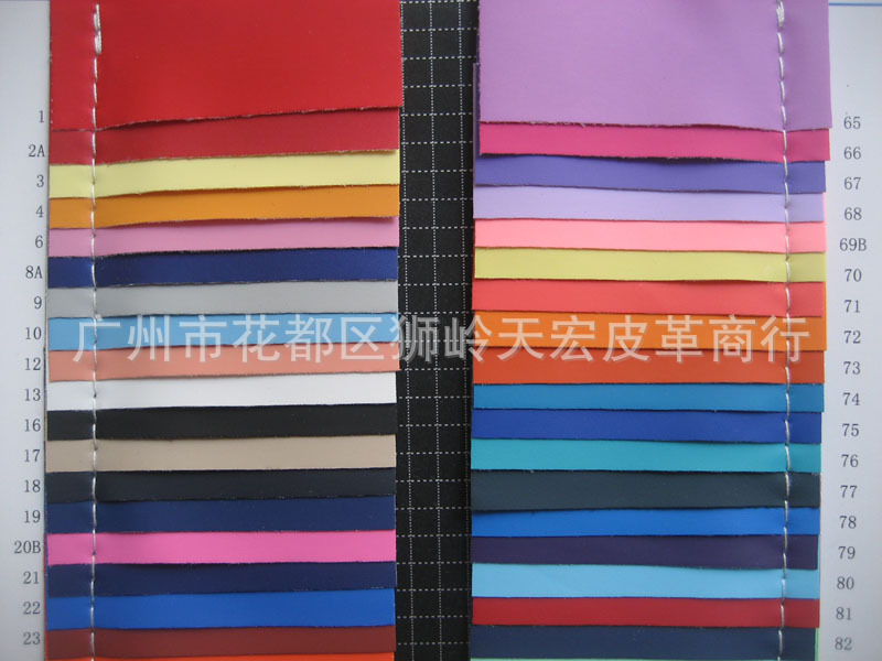 热压皮湿法哑光平纹PU人造革箱包手袋皮革皮料电压开边珠衣服皮料