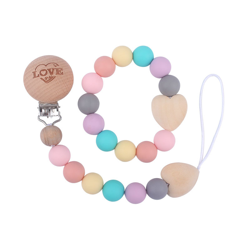 Comercio exterior nuevo bebé suministros mordedor pulsera chupete cadena traje bebé amor madera chupete cadena anti-caída