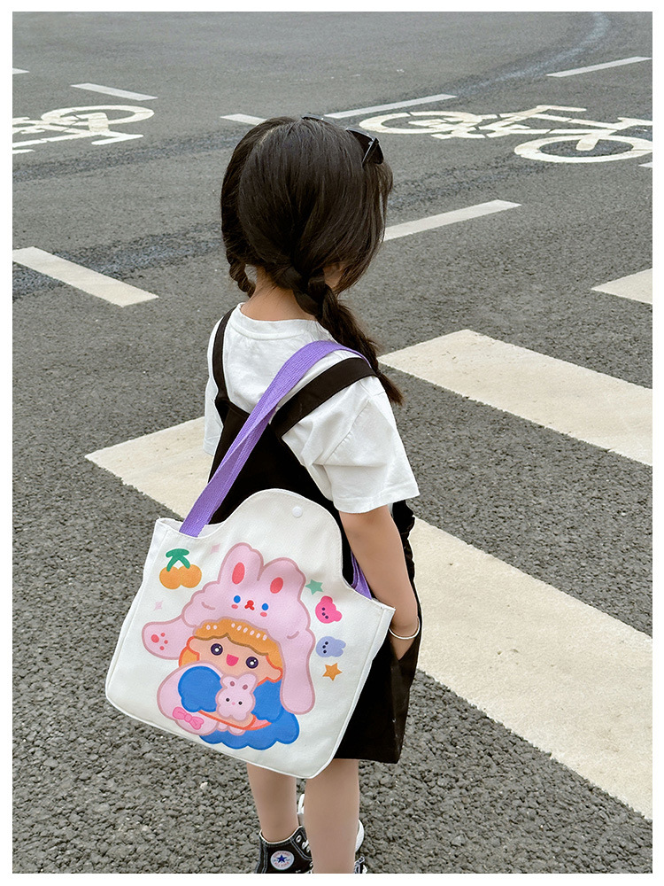 Wholesale cartoon canvas bags, female student tutorial bags, Japanese-style illustration large-capacity single-shoulder bags, cute hand-carry bags undefined