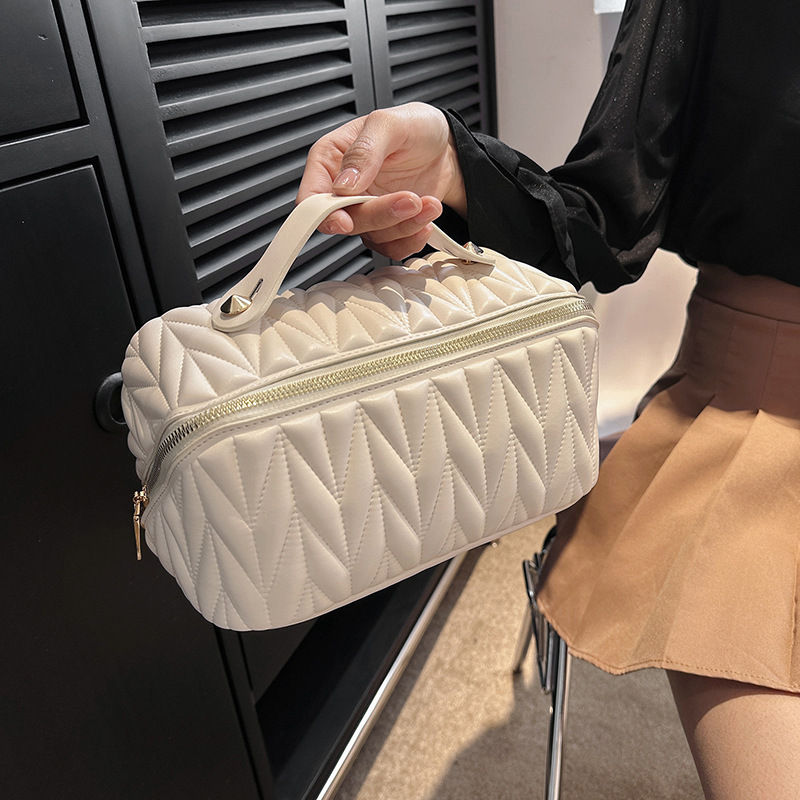 Bolsa de cosméticos portátil de alta calidad elástico suave almohada bolsa de Internet celebridad cremallera nueva partición de viaje de almacenamiento de cosméticos