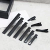 2 centimeters of black clamp black 100