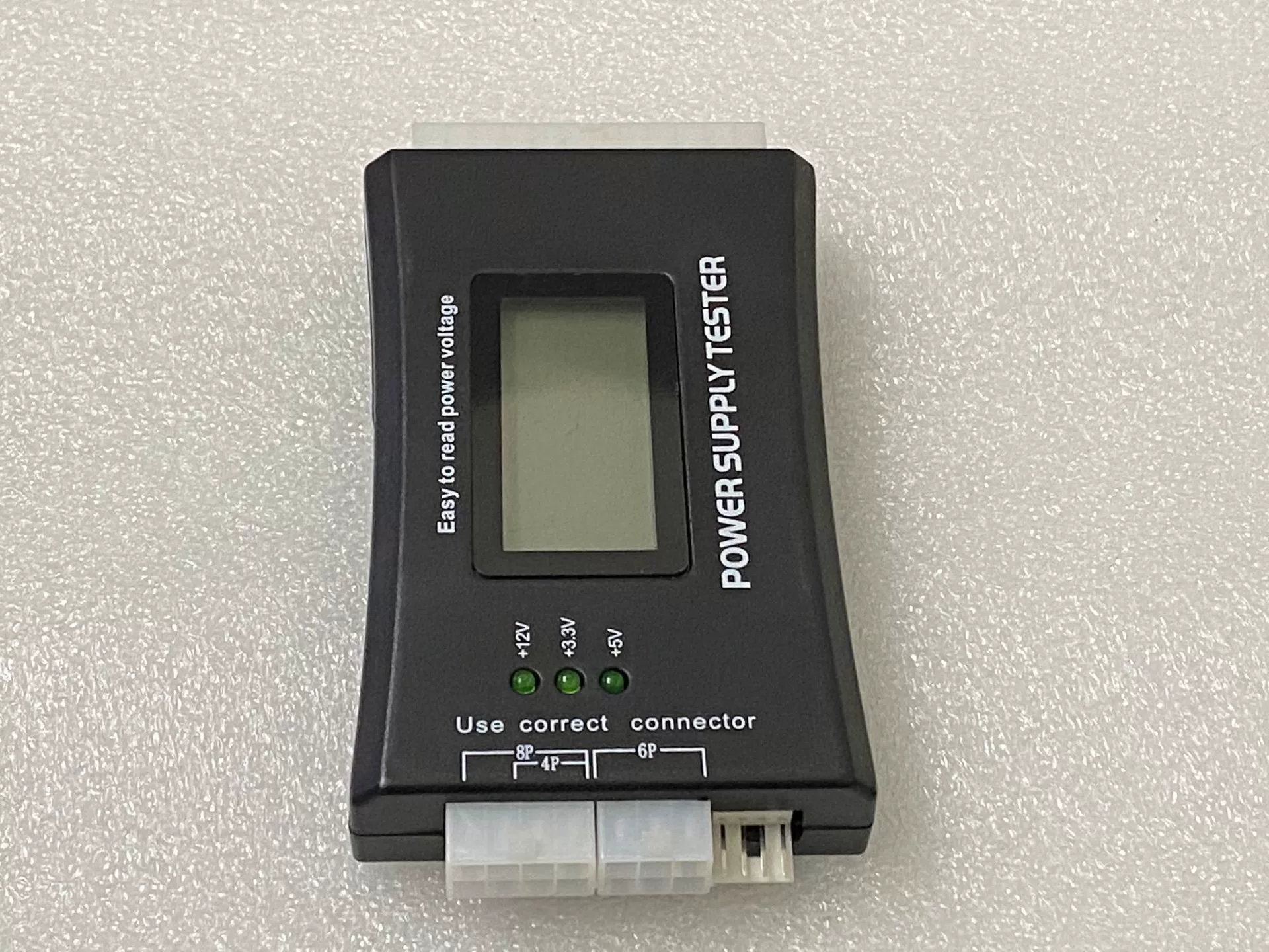 Power supply, plastic tester