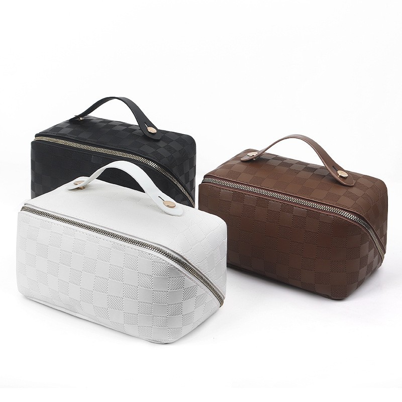 Bolsa de cosméticos de almohada tejida transfronteriza bolsa de almacenamiento de viaje portátil de gran capacidad portátil de cuero