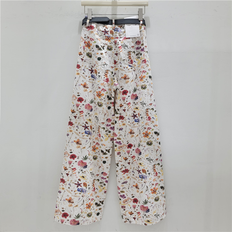 El nuevo verano de 2026 es popular este año, casual, estampado en color, flores rotas, estilo extranjero relajado, tubo recto, pantalones de piernas anchas.