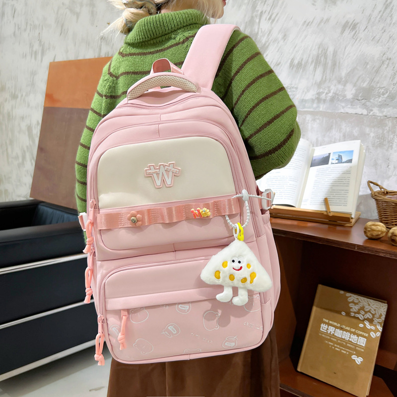 Nueva mochila de hombro simple letras negras con lindos colgantes mochila de carga mochila de gran capacidad