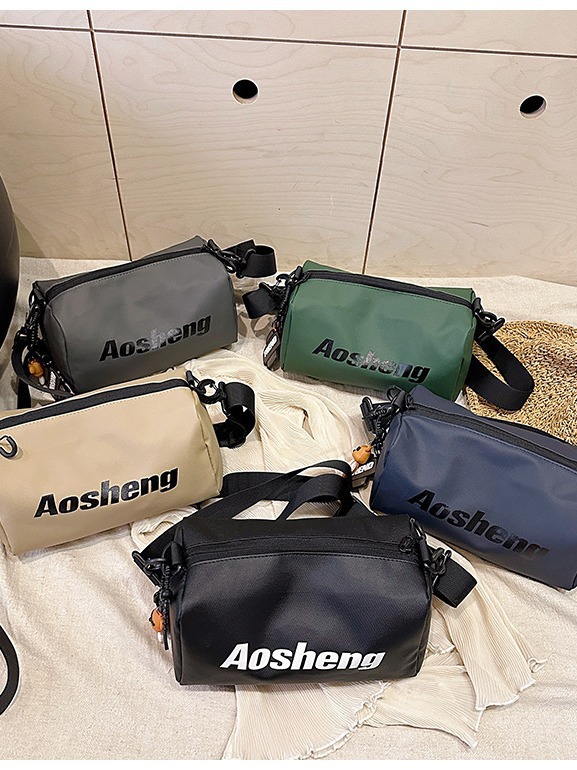 Bolsa deportiva de seda para mujeres 2024 nuevo nicho de diseño de alto nivel letras de hombro película anti-spersión bolso