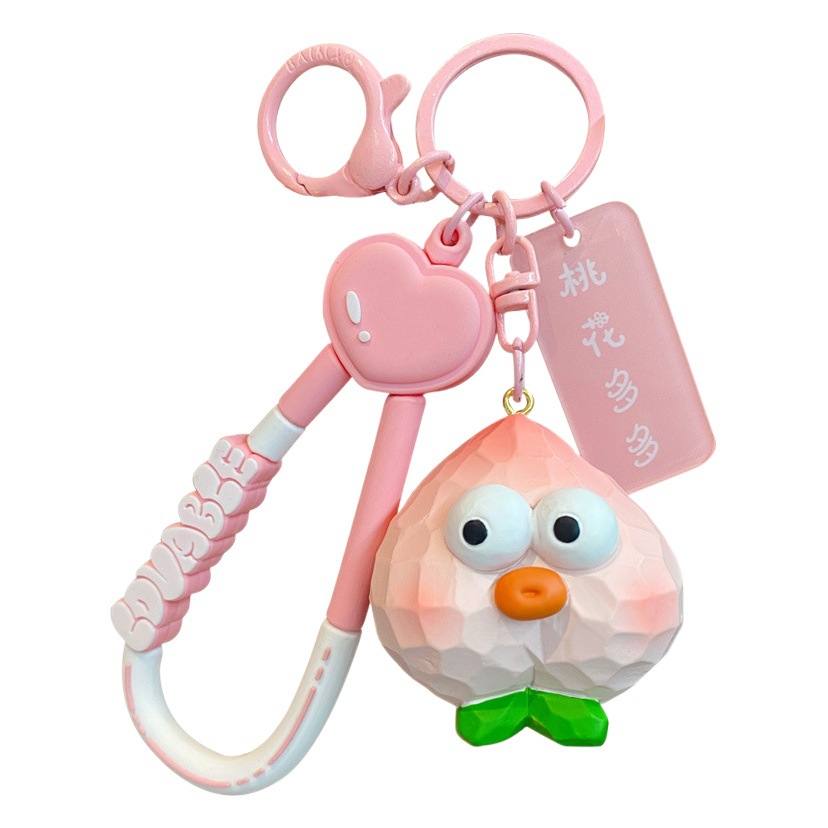 Baimao original resina talla de madera estilo serie de verduras y frutas llavero creativo divertido ojo-breaking melocotón llavero bolsa colgante