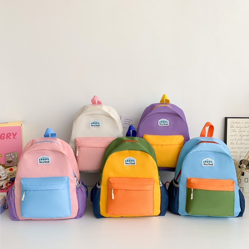 Mochila infantil de moda coreana con contraste de color letras extranjeras de gran capacidad para estudiantes de escuela primaria viajar mochila de viaje
