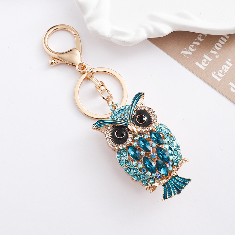Europa y América creativa transfronteriza estilo hueco búho llavero de metal con diamantes bolsos de automóviles para animales colgantes de regalo