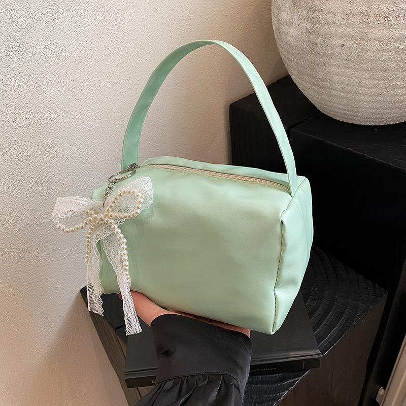 Bolsas de brazo populares de este año, bolsas de moda de moda coreana, bolsas pequeñas de primavera y verano 2025, bolsas de mujer casuales de nicho de moda.