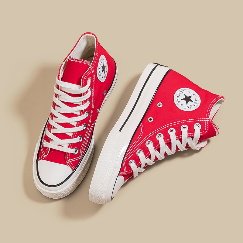Año Nuevo 2026, zapatos de lona de alto nivel rojo para mujeres, zapatos casuales con suela de goma, moda de zapatos de alto nivel transpirables.
