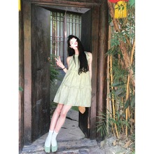 韩系绿色无袖挂脖连衣裙女夏季设计感气质蝴蝶结短裙宽松娃娃裙子